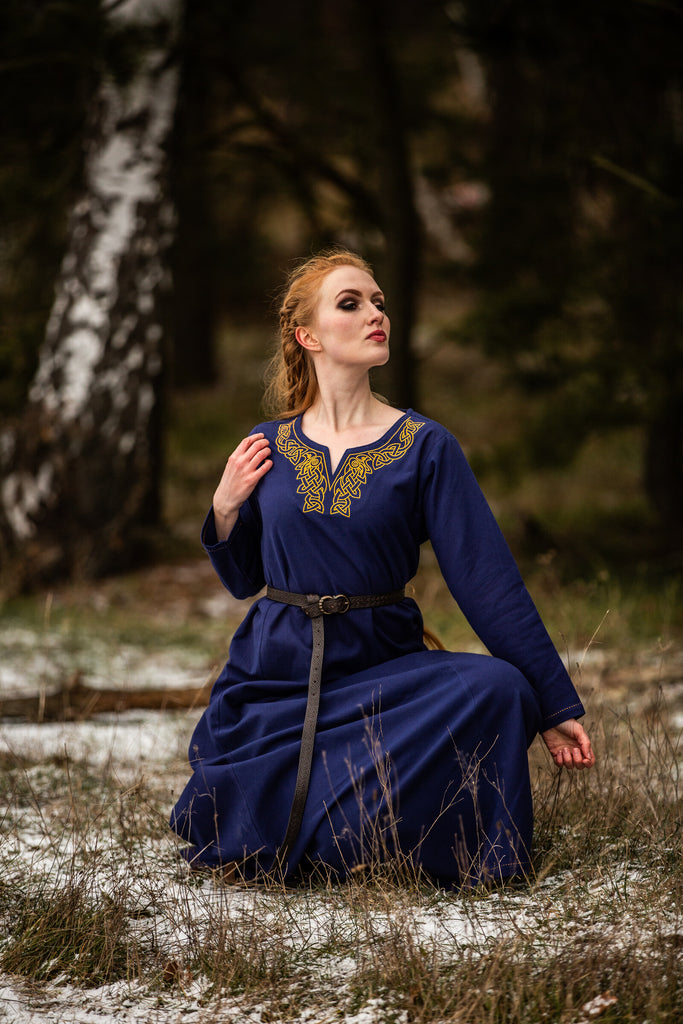 Blue embroidered cotton dress worn for comfortable everyday wear