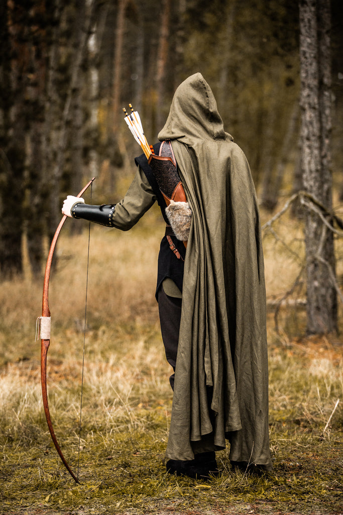 Back view of lightweight linen cloak showing full length drape and breathable fabric construction