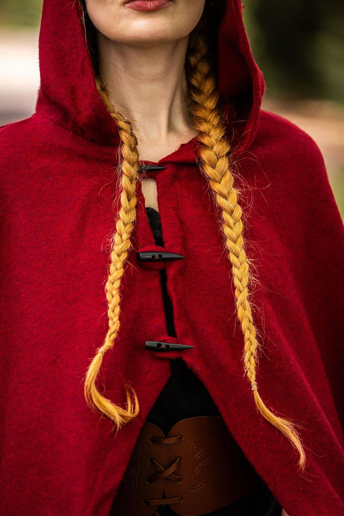 Detail of toggle-style button closures on hooded cape