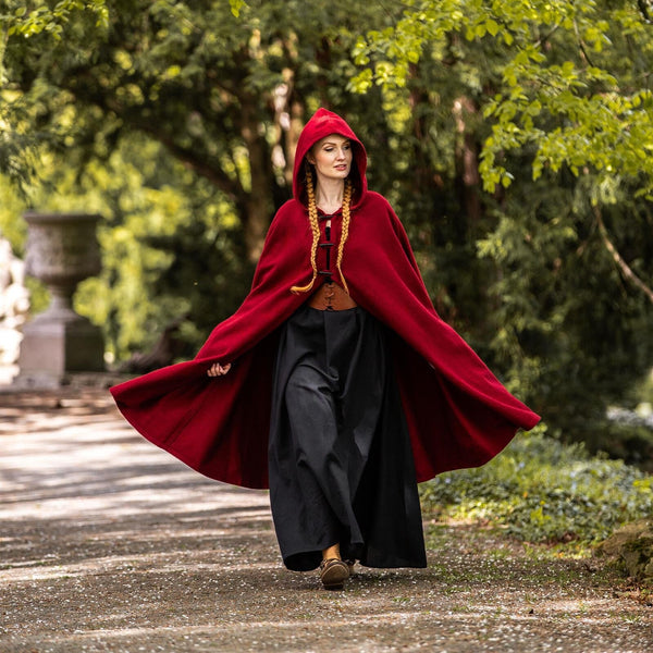 Front view of hooded cape featuring three toggle-style button closures